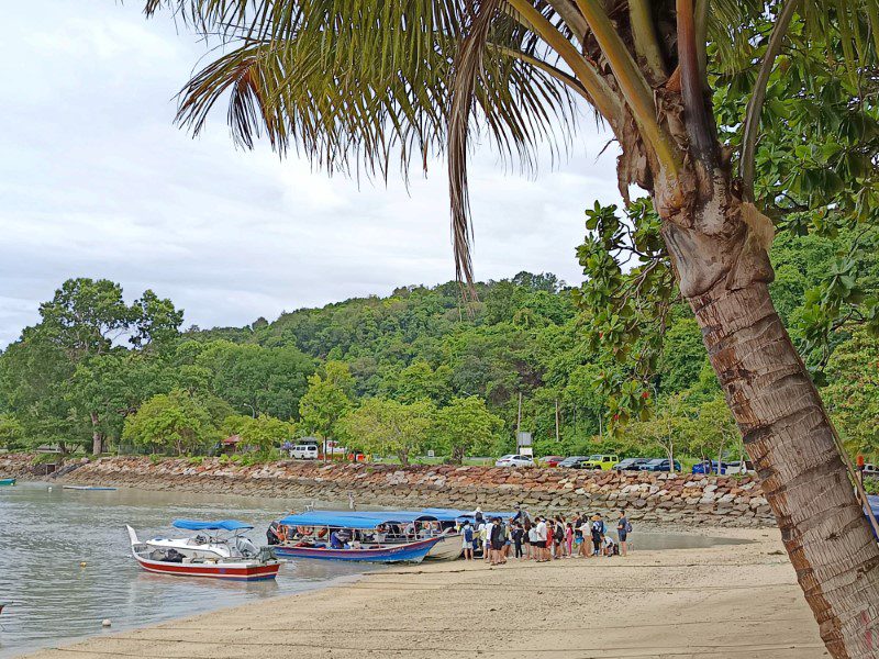 Boats departing from jetty outside Resorts World Langkawi for Island Hopping